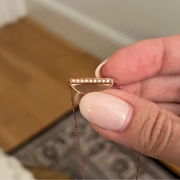 NWOT 14k rose gold and Diamond half moon pendant (.1ctw)